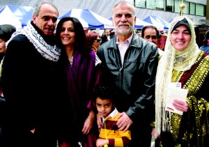 Palestinian Ambassador Waleed Siam, his wife Maaki, and their son Karim with outgoing Iraqi ambassador Ghanim Al-Jumaily and his wife Widad Slah