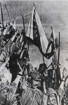 Victorious soldiers of the Japanese Imperial Army celebrate another victory in early 1942