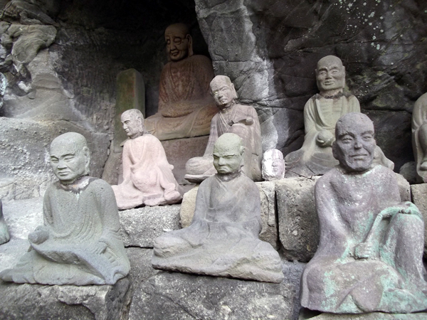 Statues of Buddhist devotees and deities