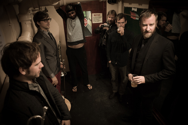 The National during 2011’s High Violet tour. Tom Berninger (third from the right), brother of singer Matt (first on the right), accompanied the band as a roadie and rookie filmmaker
