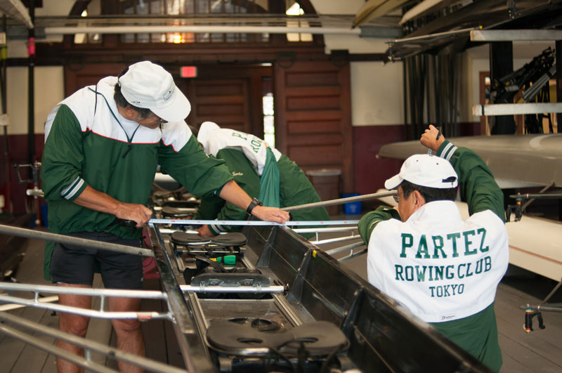 The crew prepares their boat for the race