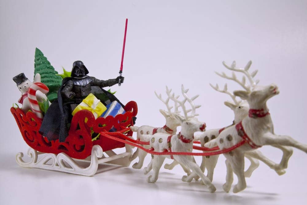 darth vader in santa's sleigh being pulled by reindeer