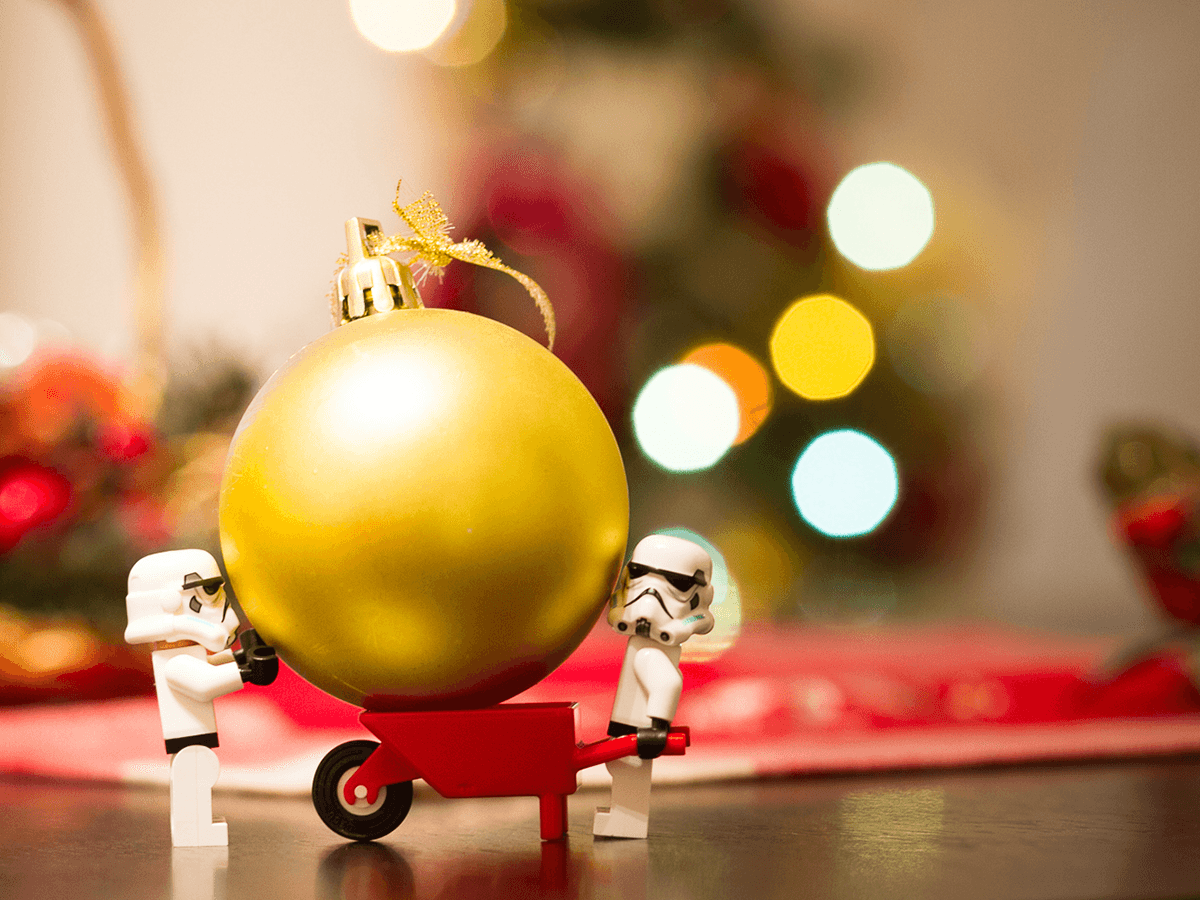 lego stormtroopers moving a Christmas ornament