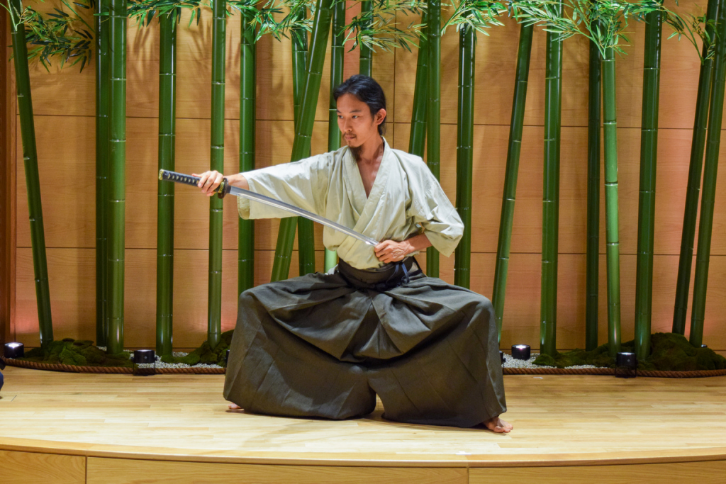 Swordsman brandishes samurai sword at The Japanese Sword Museum