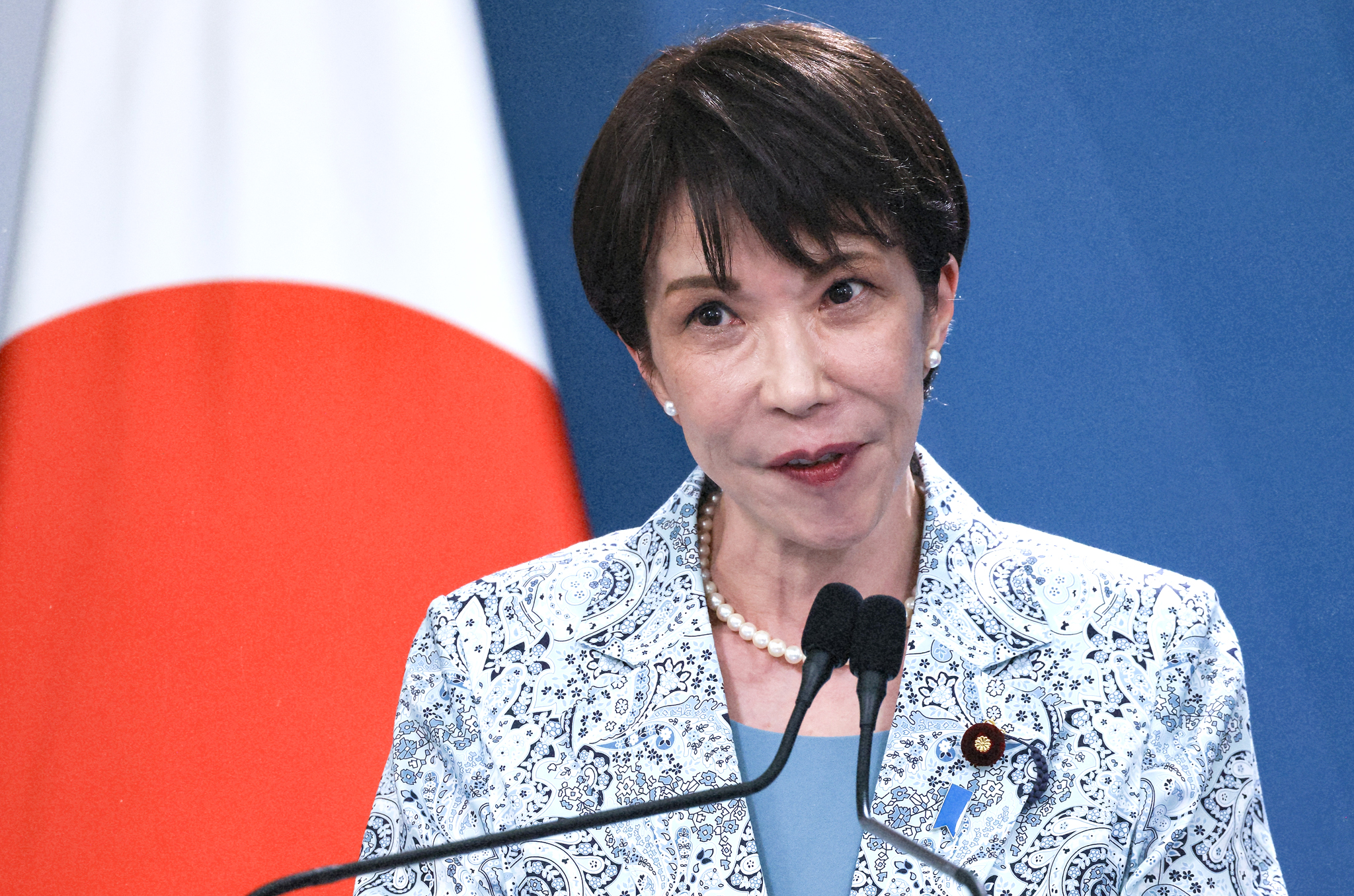 japan considering cap on foreign residents